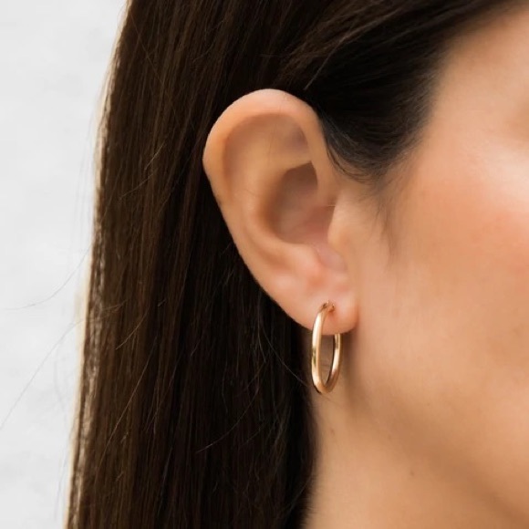 Gold tone huggie hoop earrings - Picture 3 of 4